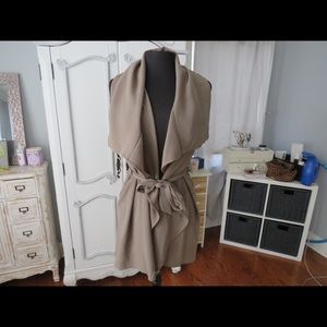 Brownish/tan sleeveless cardigan